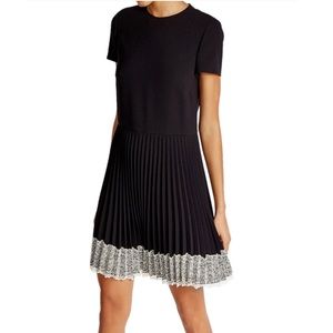 Red Valentino pleated mini dress with lace